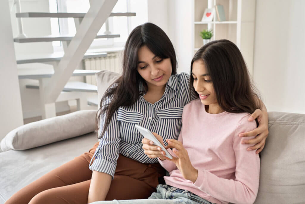 Mother having a conversation with her daughter