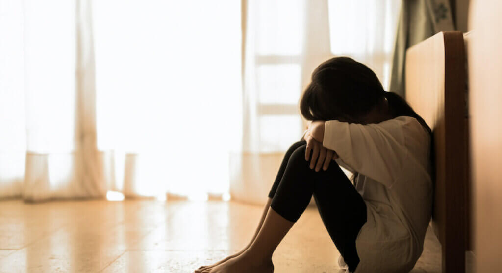 Girl cries at home